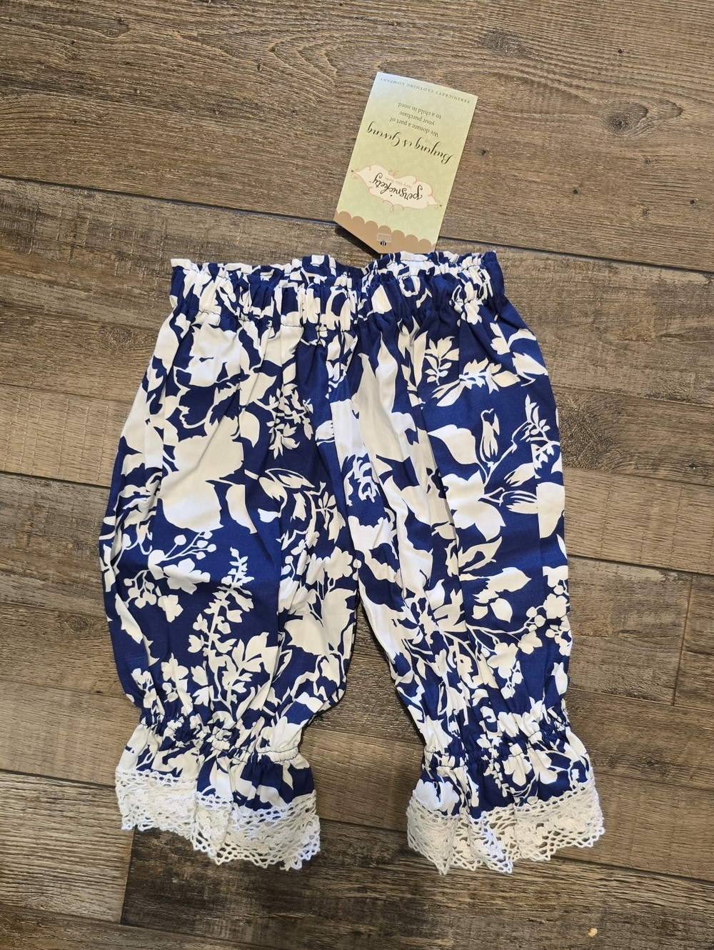 Persnickety Navy and White Floral Ruffle Hem Pants